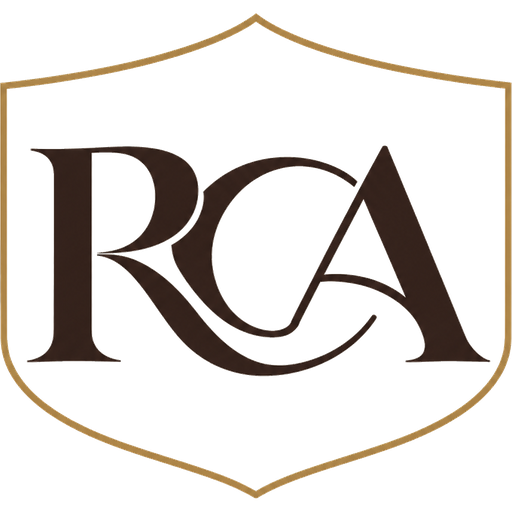 Roslyn Clark Artis crest: the letters RCA inside a shield.